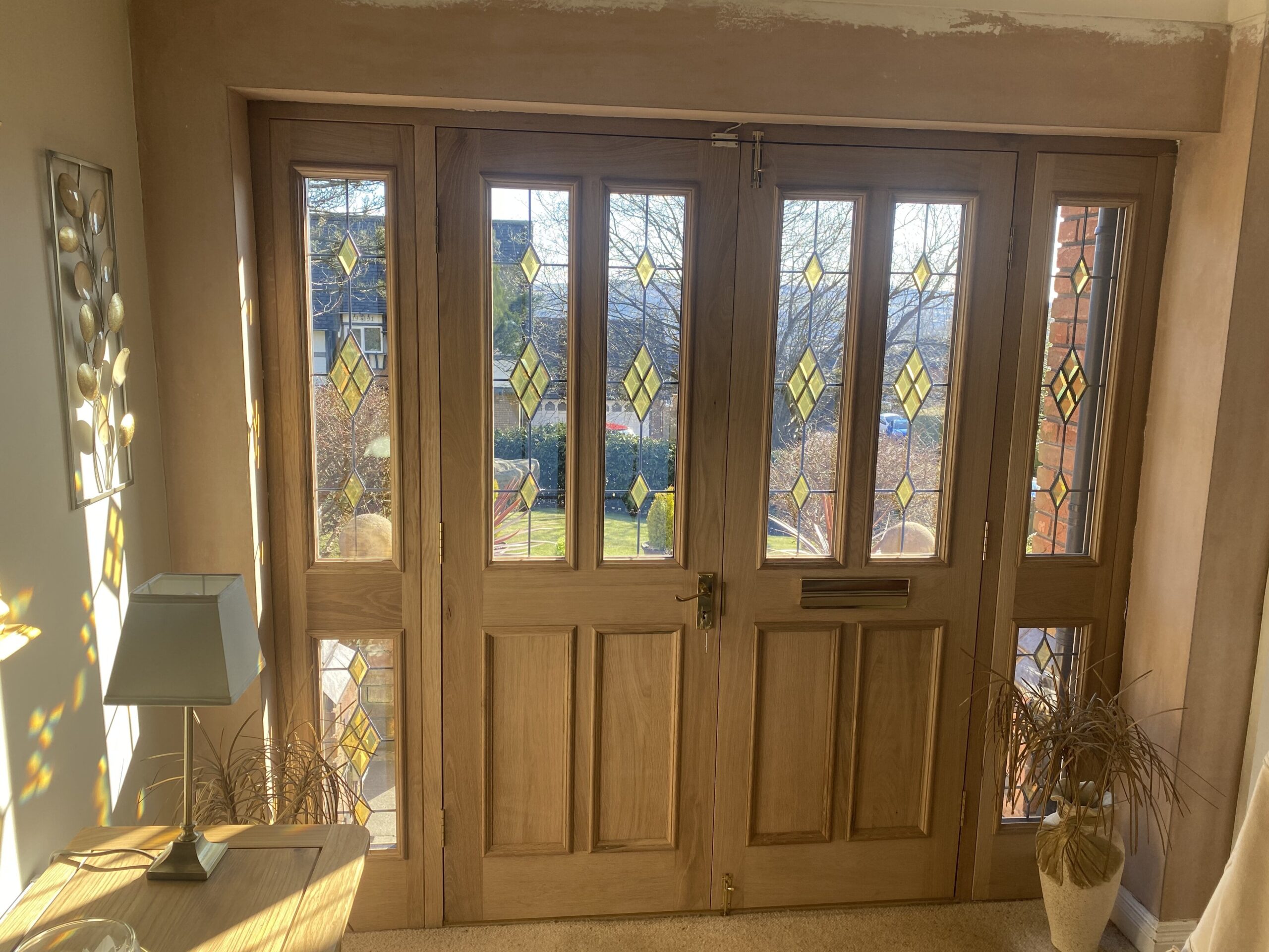 Oak internal joinery doors with stained glass windows